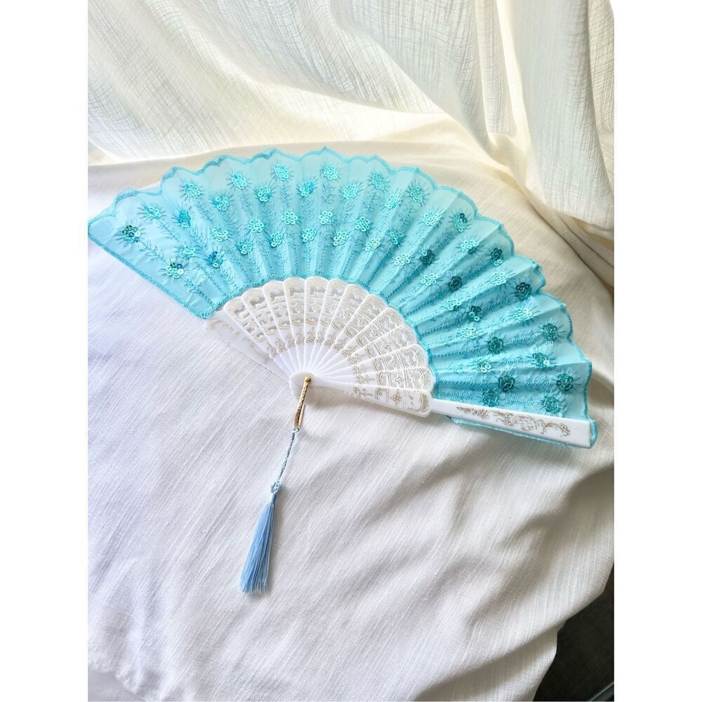 Bright blue and white sequin embellished hand fan with tassel 